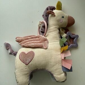 Itzy Ritzy Cream Unicorn Plush with Colorful Ribbon teether sensory toy